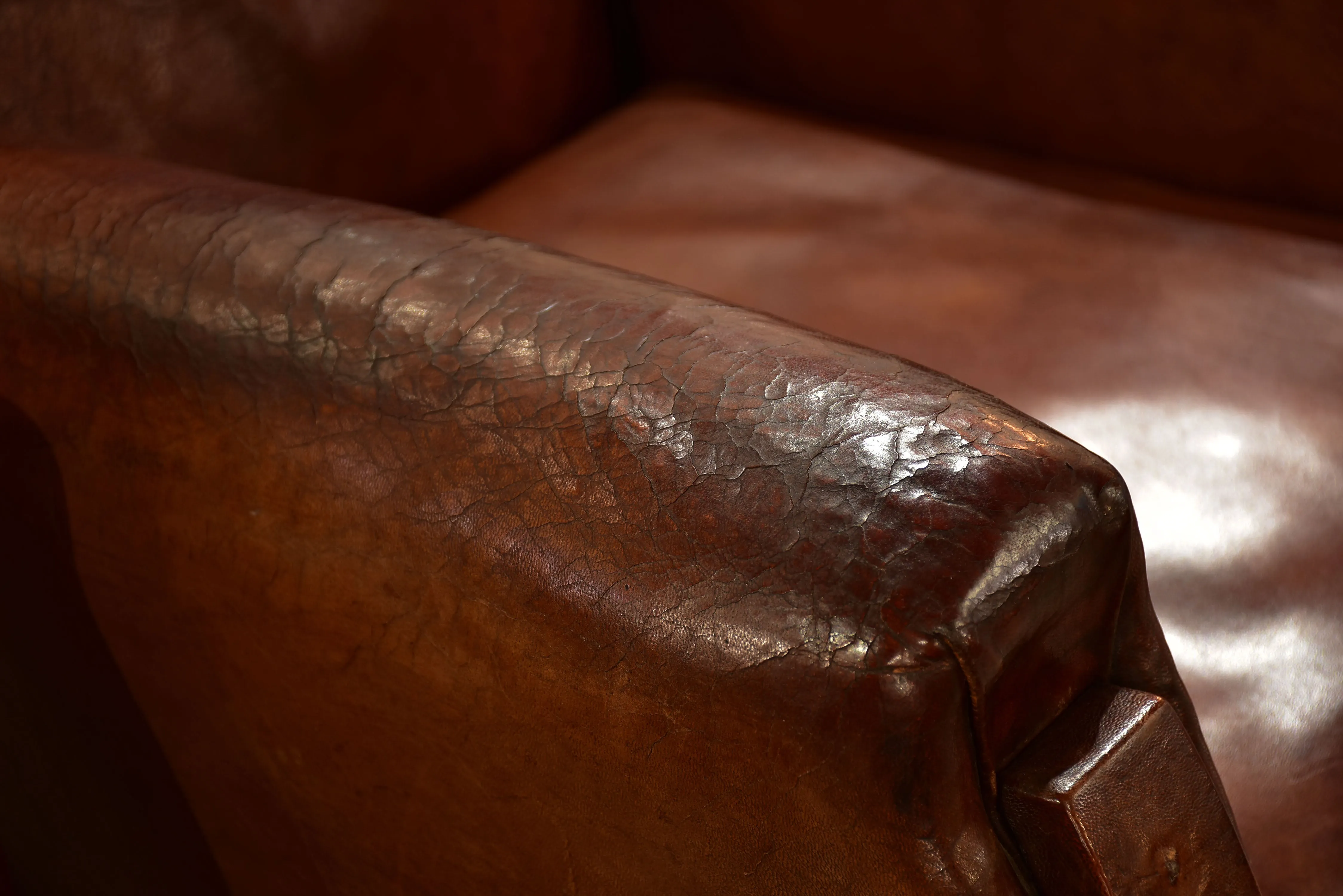 Pair of French leather club chairs from the 1930's with stud detail