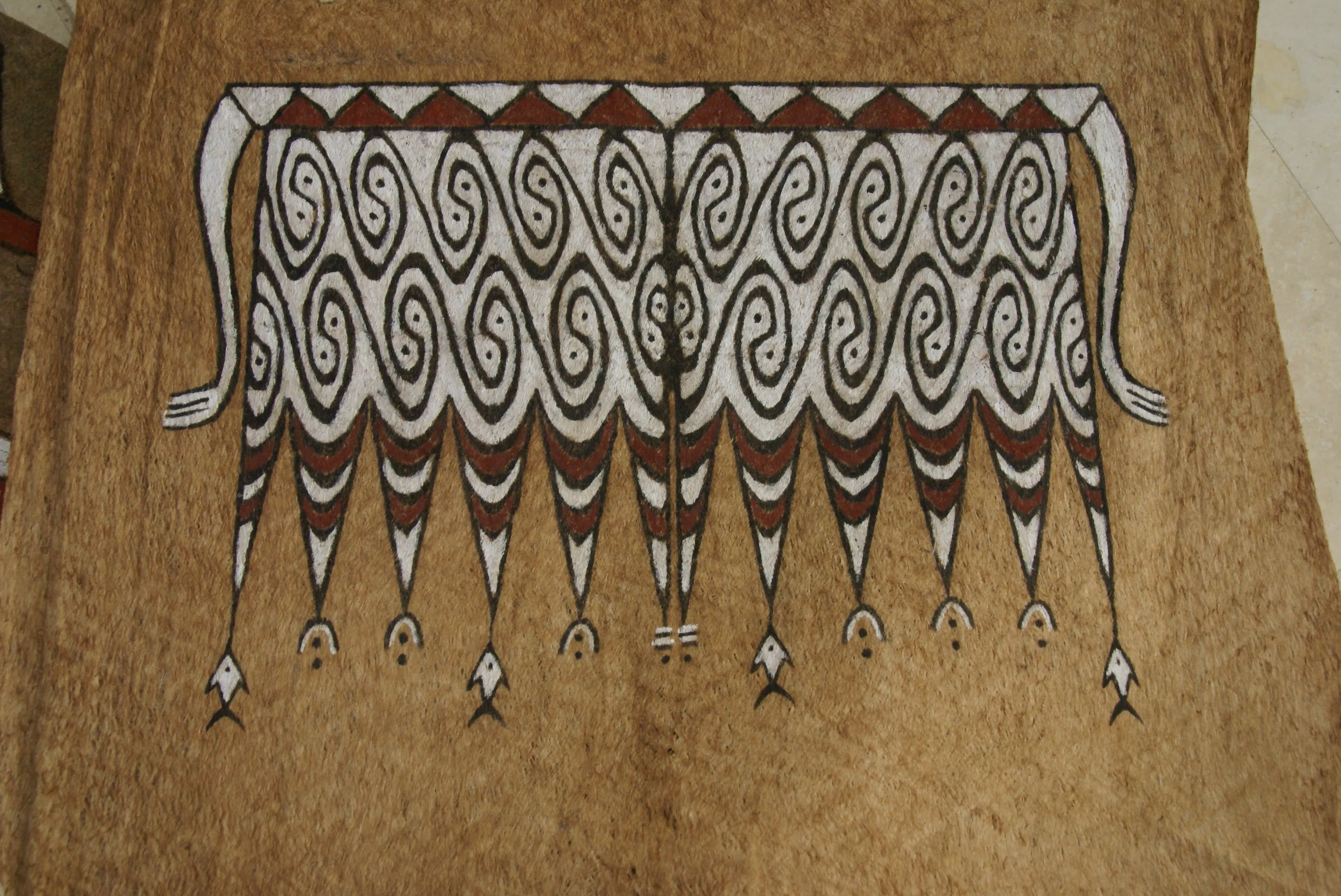 Rare Maro Tapa loin Bark Cloth (Kapa in Hawaii), from Lake Sentani, Irian Jaya, Papua New Guinea. Hand painted by a Tribal Artist with natural pigments: Spiritual Stylized Fish Motifs & waves 30" x 24" (no 5)