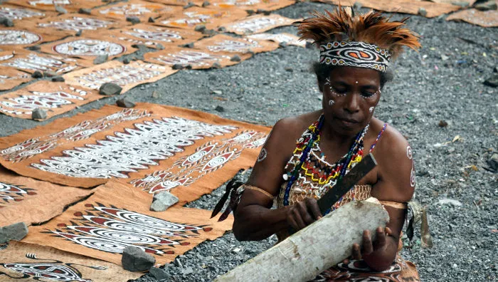 Rare Maro Tapa loin Bark Cloth (Kapa in Hawaii), from Lake Sentani, Irian Jaya, Papua New Guinea. Hand painted by a Tribal Artist with natural pigments: Spiritual Stylized Fish Motifs & waves 30" x 24" (no 5)