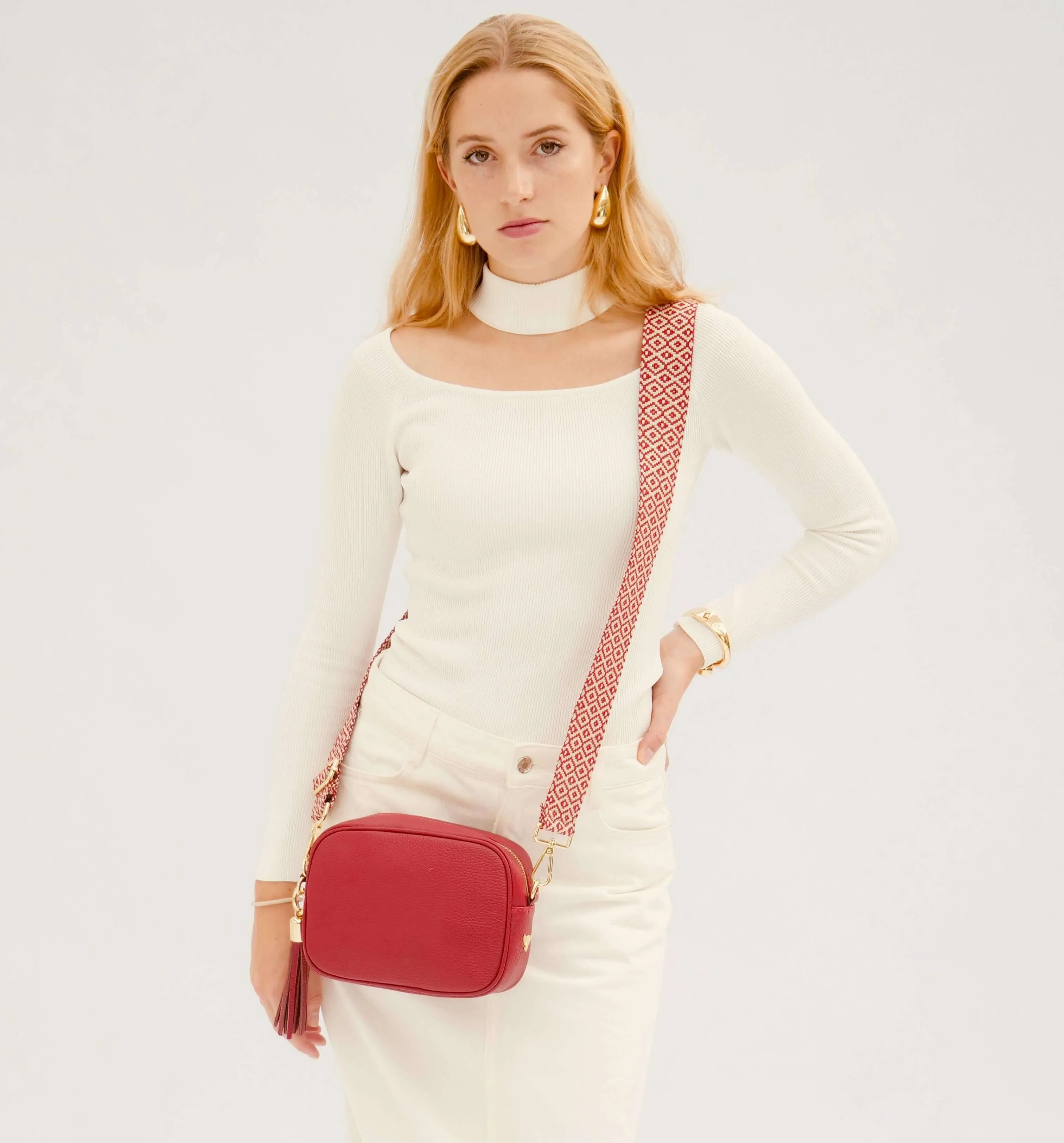 The Tassel Cherry Red Leather Crossbody Bag With Red Cross-Stitch Strap