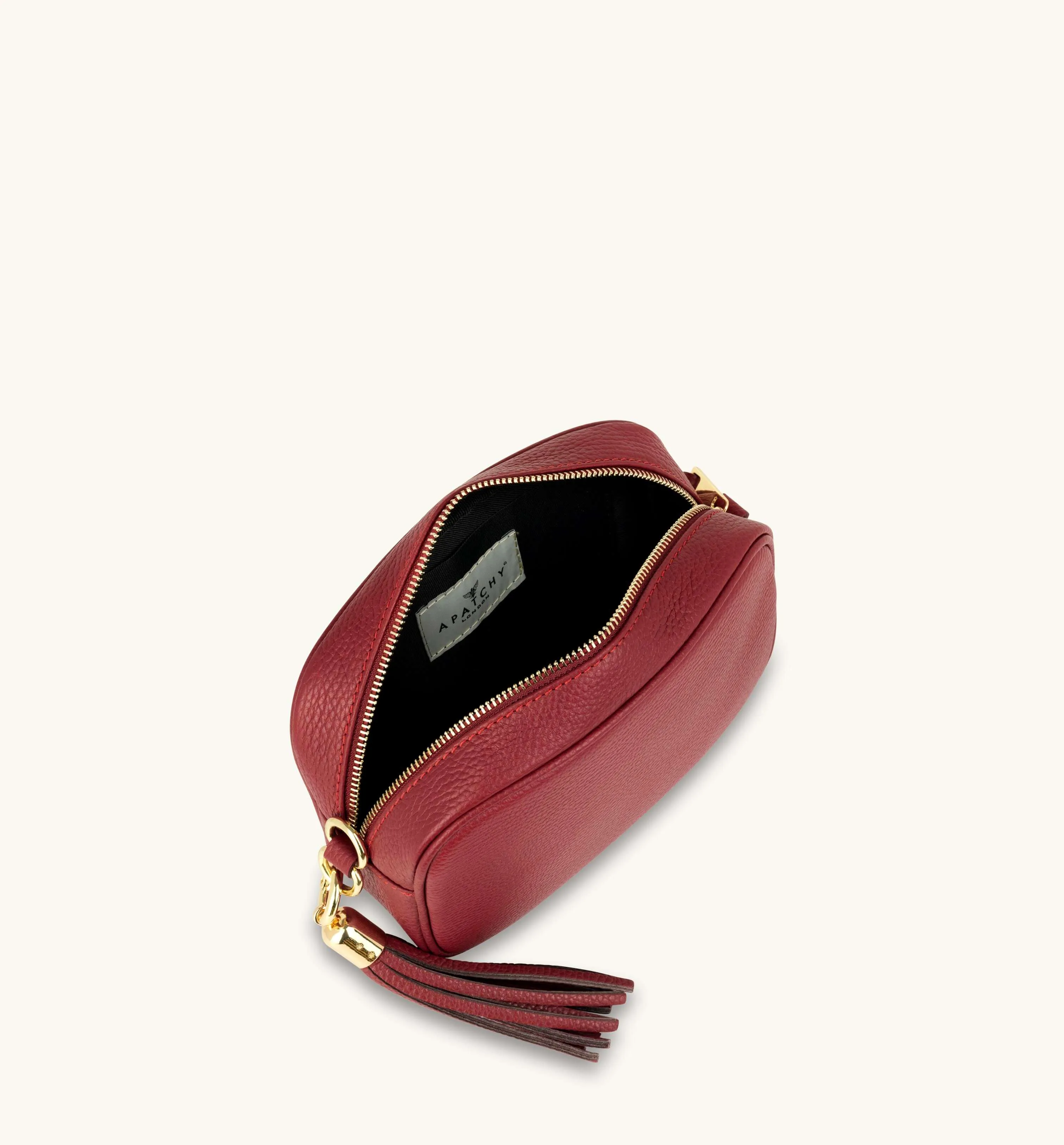 The Tassel Cherry Red Leather Crossbody Bag With Red Cross-Stitch Strap